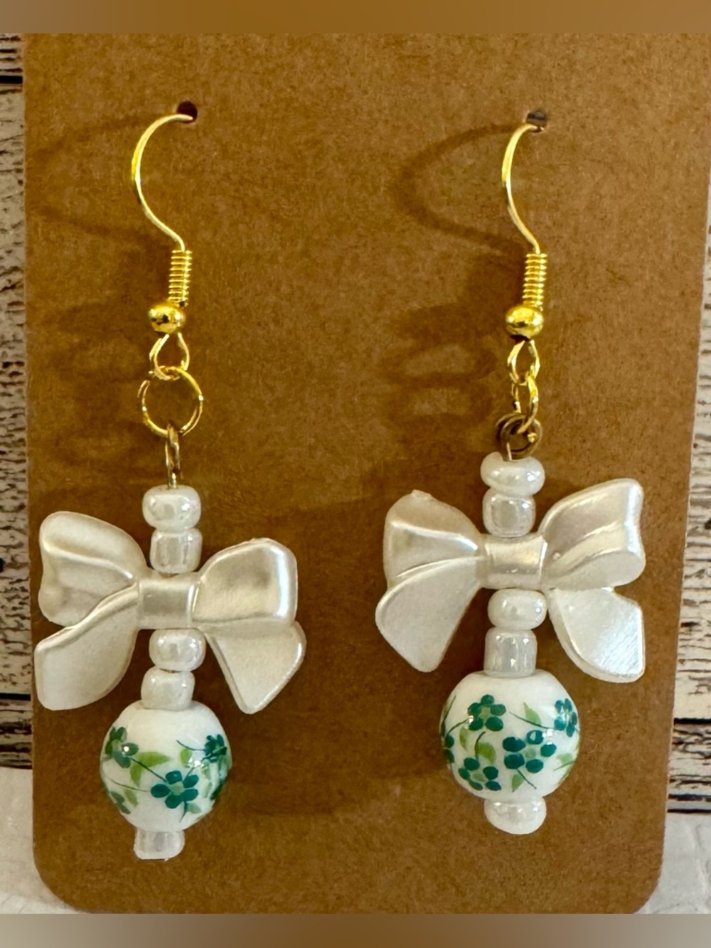 White Faux Pearl Bow Drop Earrings with Green Floral Beads